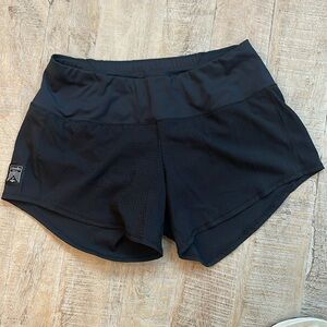 Oiselle Women’s 4” running shorts. Black. Size 4.  Never worn
